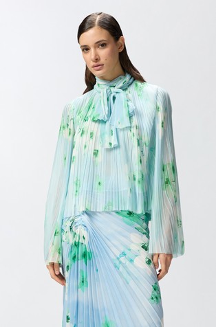 Plissé blouse with floral pattern