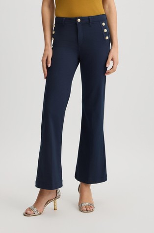 Flared trousers with decorative buttons