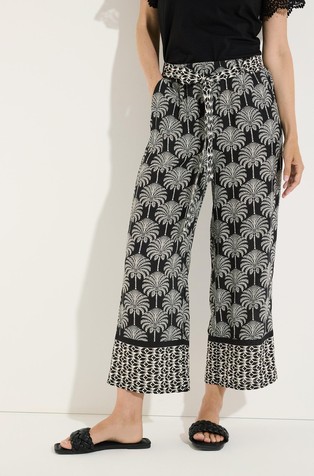 Cropped viscose trousers with palm print