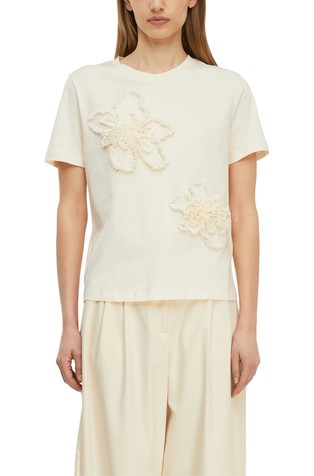 Majica s cvetlično aplikacijo