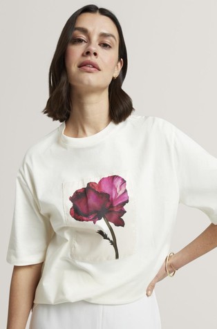 Majica s cvetličnim našitkom