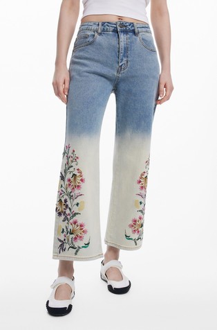 Flared jeans with floral embroideries