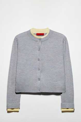 Pletena volnena jopa s kontrastnimi obrobami