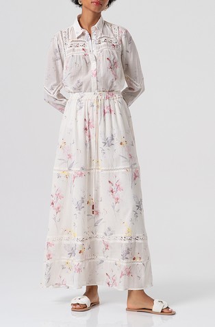 Eyelet long skirt with flowery pattern