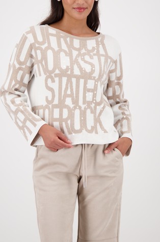 Pleten pulover z vzorcem napisov in bleščicami