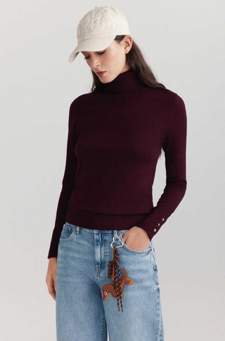 Turtleneck knit jumper with decorative buttons