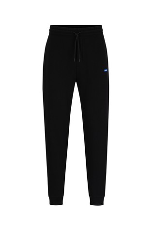 Bombažna trenirka s frotirano notranjostjo in logo našitkom