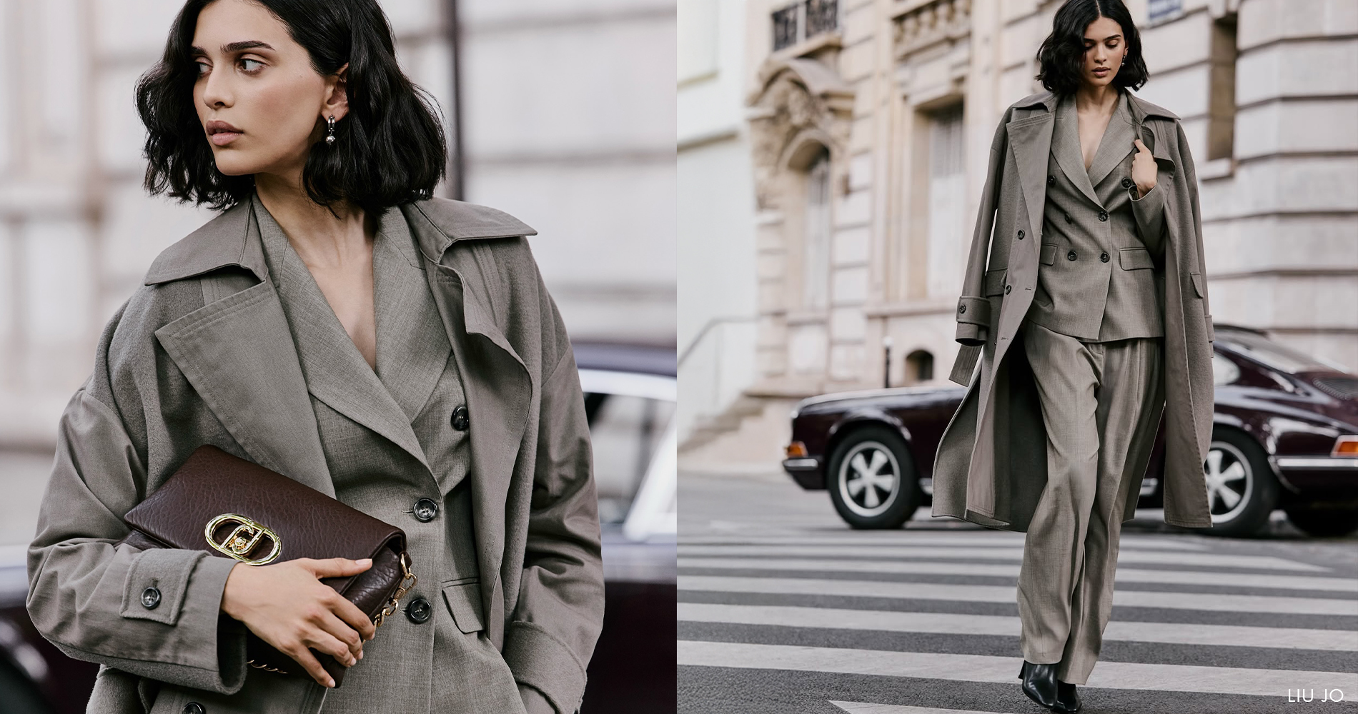 An elegant woman in a grey tailored suit and matching trench coat walks confidently down a city street, embodying refined contemporary street style.